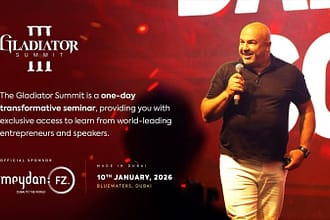 Dariush Soudi is presenting on stage at Gladiator Summit, a high-energy leadership and business seminar featuring global entrepreneurs.